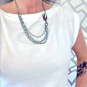 Triple strand necklace with turquoise beads